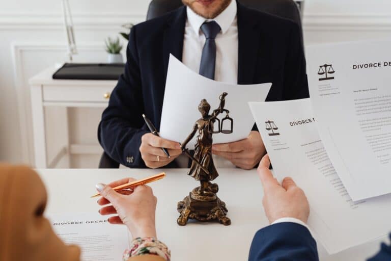 lawyers looking at divorce paper for Cameras in NY Courts